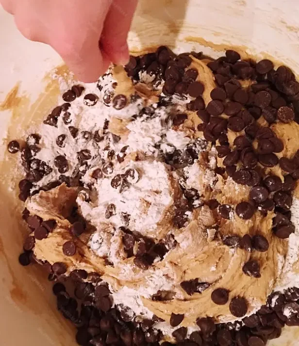 Ingredients for baking cookies, including chocolate chips